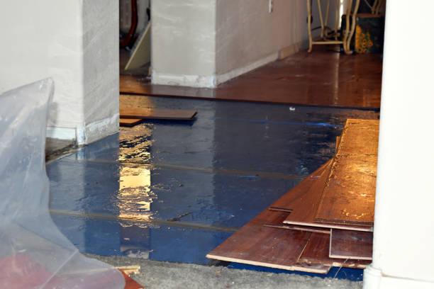 Professional Flood Damage Restoration technician working in Devon, PA
